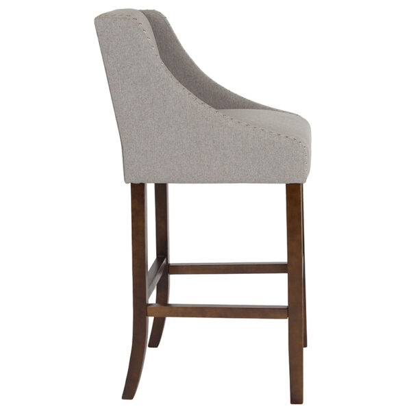 Lowest Price Carmel Series 30" High Transitional Walnut Barstool with Accent Nail Trim in Light Gray Fabric
