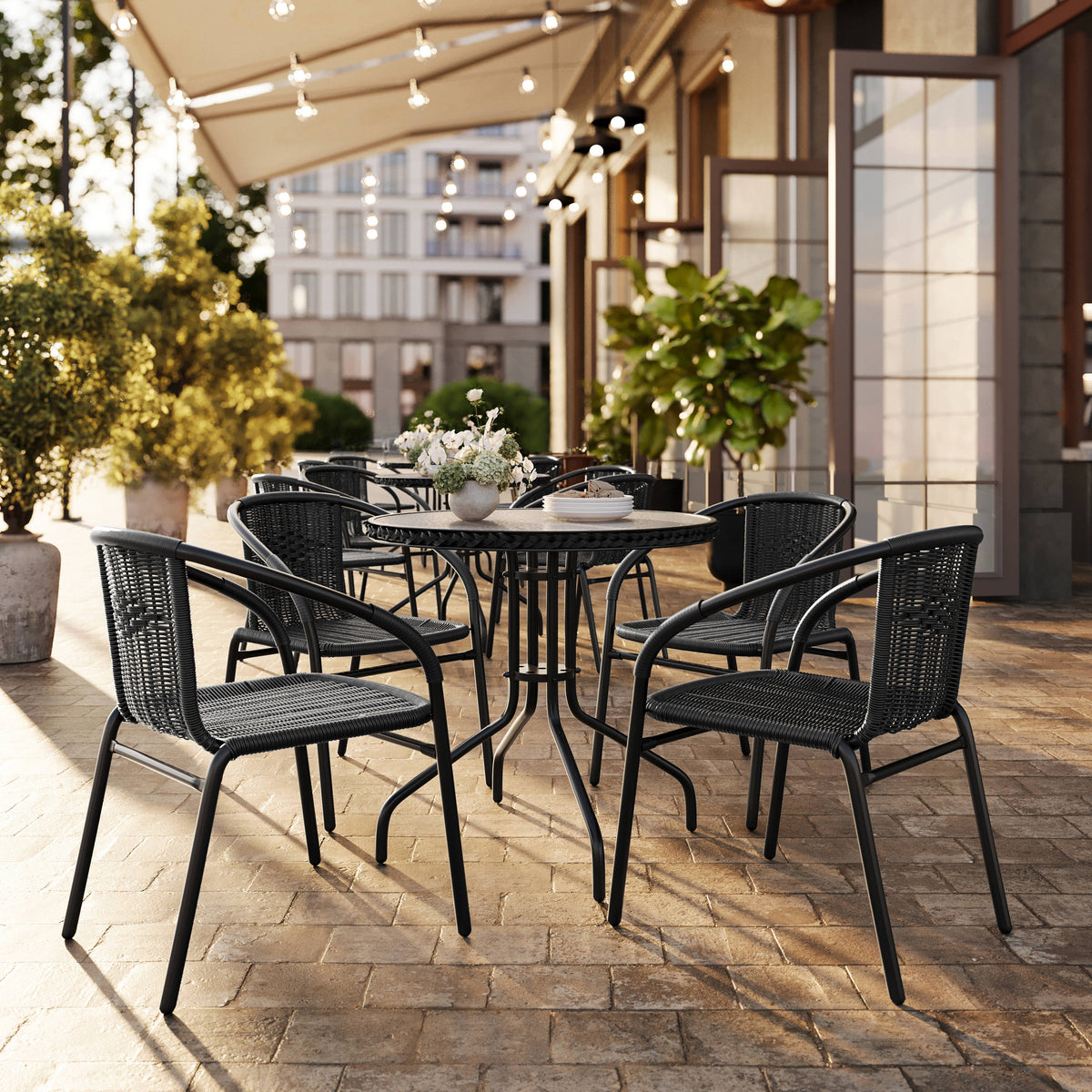 28'' Round Glass Metal Table with Rattan Edging and 4 Rattan Stack Chairs - Image 2