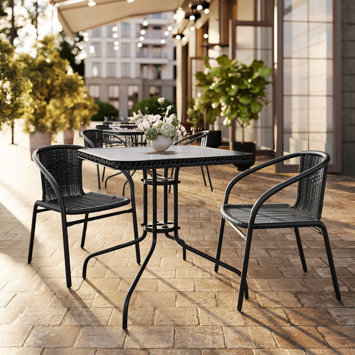 28'' Square Glass Metal Table with Rattan Edging and 2 Rattan Stack Chairs - Image 2