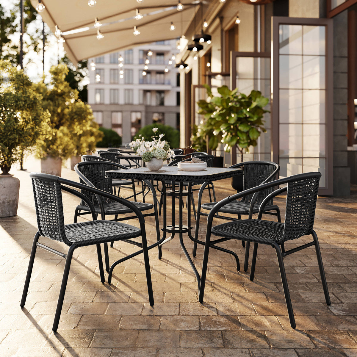 28'' Square Glass Metal Table with Rattan Edging and 4 Rattan Stack Chairs - Image 2