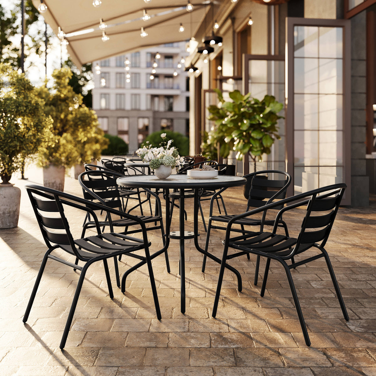 31.5" Round Glass Metal Table with 4 Metal Aluminum Slat Stack Chairs - Image 2